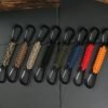 Llavero Paracord cordón trenzado de doble hebilla.